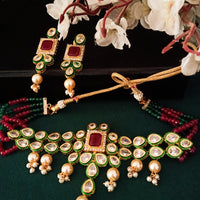 N060_Classy Layered Kundan Necklace studded with dazzling White and bright Square shaped Red stones with a touch of  pearls.