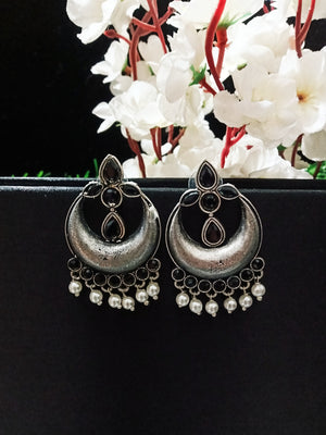 E0744_Trendy crafted german silver oxidized earrings with a touch of stones and beads.