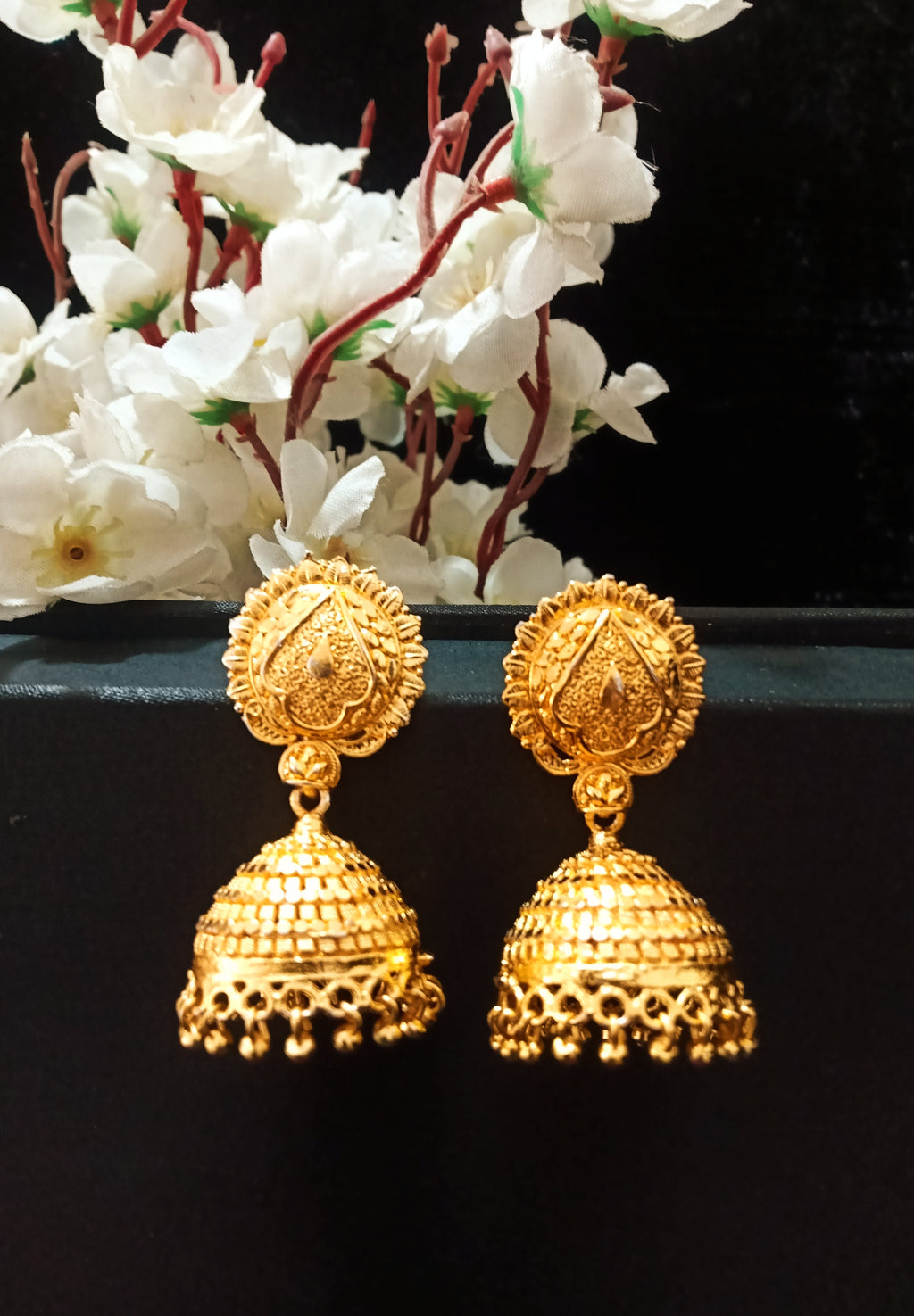 E0780_Gorgeous traditional style golden color jumkas with delicate designs with bead drops.