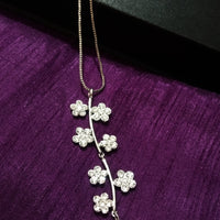 N0267_Elegant trendy long necklace with a touch of sparkling stones with delicate flower  designs.