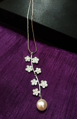 N0267_Elegant trendy long necklace with a touch of sparkling stones with delicate flower  designs.