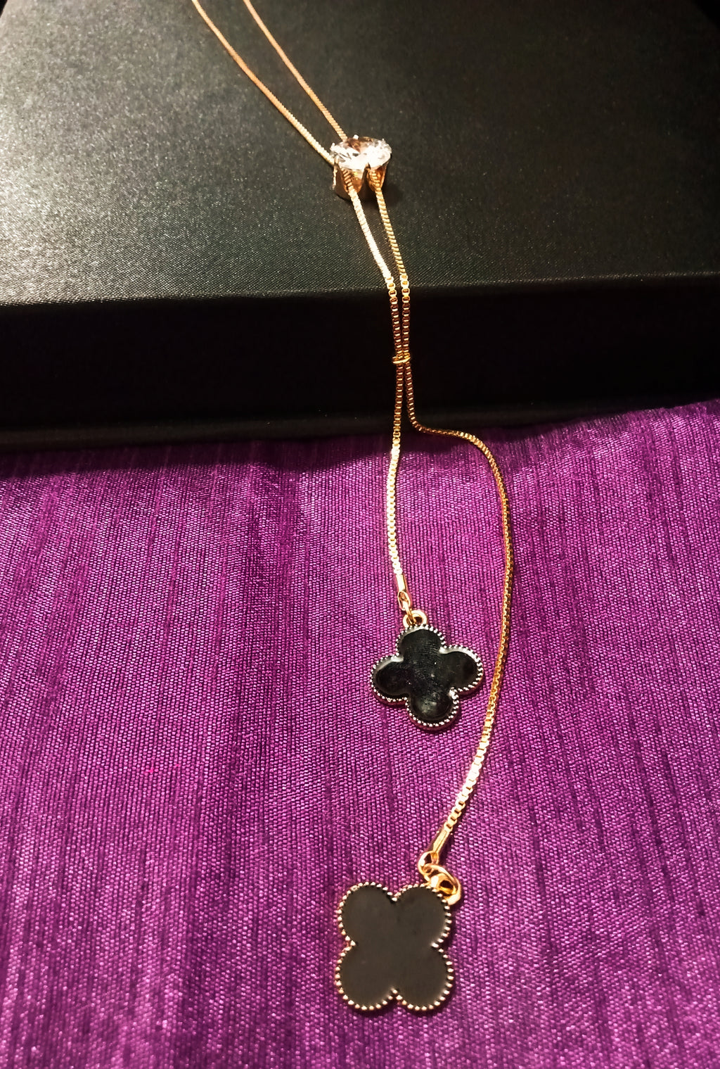 N0270_Elegant trendy long necklace with a touch of sparkling stones flower shaped pendant.