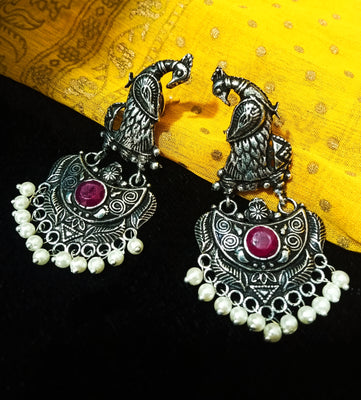 E0759_Classic crafted peacock design German silver oxidized danglers with a touch of stones and bead drops.