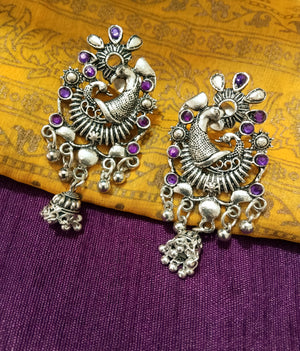 E0769_Lovely crafted German silver oxidized peacock pattern danglers with a touch of jumka drops studded with stones along with bead drops.