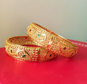 B0169_Gorgeous Crafted Gold plated bangles with delicate designs with a touch of stones.