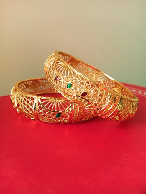 B0170_Gorgeous Crafted Gold plated bangles with beautiful designs with a touch of stones.