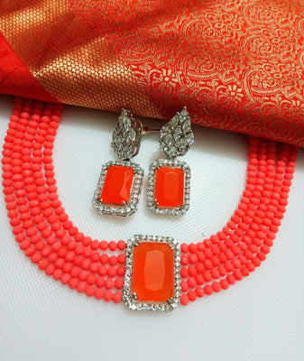 N0282_Classy deep orange crystal choker necklace set studded with dazzling American diamond stones.