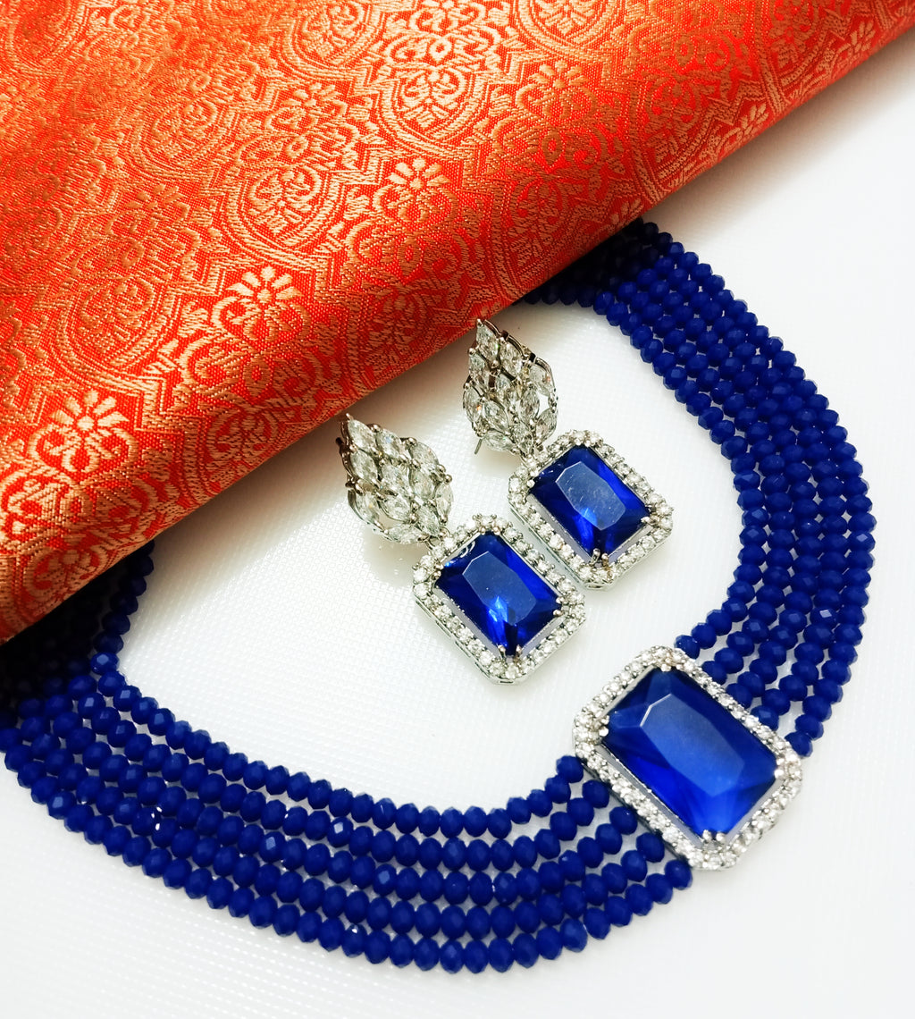 N0283_Royal blue crystal choker necklace set studded with dazzling American diamond stones.