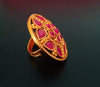 R027_Gorgeous circular shaped golden color rings with a touch of semi precious pink ruby  stones.