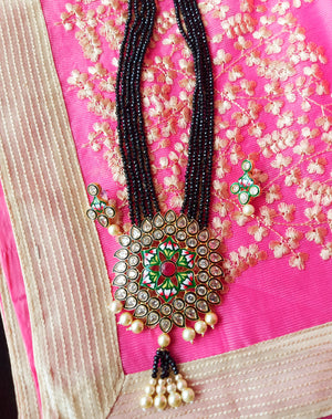 N0129_Gorgeous black Crystal necklace set studded with kundan stones with a touch of pearls.