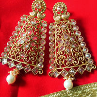 E0795_Grand crafted designer golden color danglers studded with a touch of dazzling american diamond stones with a touch of pearl drops.