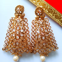 E0795_Grand crafted designer golden color danglers studded with a touch of dazzling american diamond stones with a touch of pearl drops.