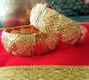 B0190_Gorgeous traditional style Gold plated screw type adjustable broad bangles with delicate craft work.