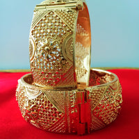 B0190_Gorgeous traditional style Gold plated screw type adjustable broad bangles with delicate craft work.