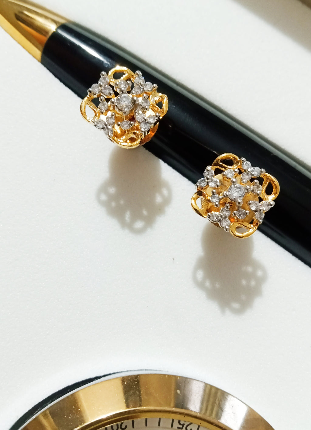 E0797_Premium American Diamond studs with delicate stone work.