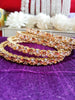 B062_Gorgeous Gold plated bangles studded with  American Diamond stones.