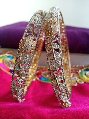 B067_Gorgeous  American Diamond  gold plated bangles with delicate stone work.