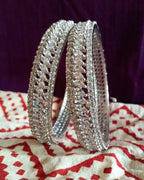 B053_ Classy Silver plated bangles studded with  American Diamond stones.