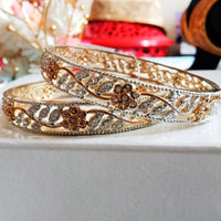 B063_Gorgeous gold plated bangles  studded with  American Diamond  stones.