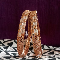 B057_ Classy Rose Gold plated bangles studded with  American Diamond stones.