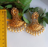 E0835_Gorgeous Golden Meenakari style earrings studded with stones with a touch of pearls.