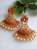 E0835_Gorgeous Golden Meenakari style earrings studded with stones with a touch of pearls.