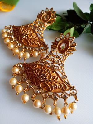 E0835_Gorgeous Golden Meenakari style earrings studded with stones with a touch of pearls.