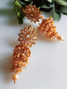 E0834_Gorgeous Golden Meenakari style danglers studded with stones with a touch of pearls.