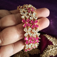 B0156_Elegant flower design studded with American Diamond stones.