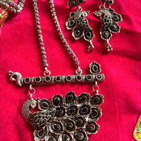 N0309_ Gorgeous German Silver oxidized peacock design crafted necklace with delicate work with a touch of stones.