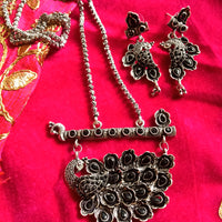 N0309_ Gorgeous German Silver oxidized peacock design crafted necklace with delicate work with a touch of stones.