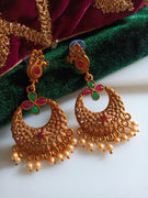 E0838_Beautiful golden color peacock design earrings studded with ruby stones with  bead drops.