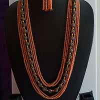 N013_Gorgeous peach colored crystal necklace studded with semi precious stones.