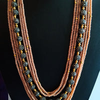 N013_Gorgeous peach colored crystal necklace studded with semi precious stones.