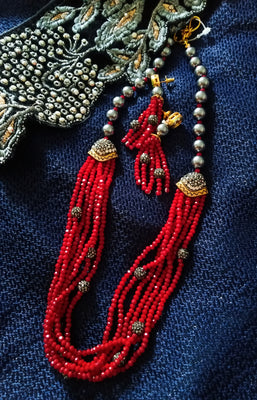 N0134_Gorgeous red color Crystal necklace set studded with stones with a touch of beads.