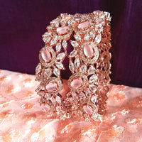 B0213_S_Elegant flowery design Bangles studded with American Diamond stones with a touch of pink stones with delicate stone work.