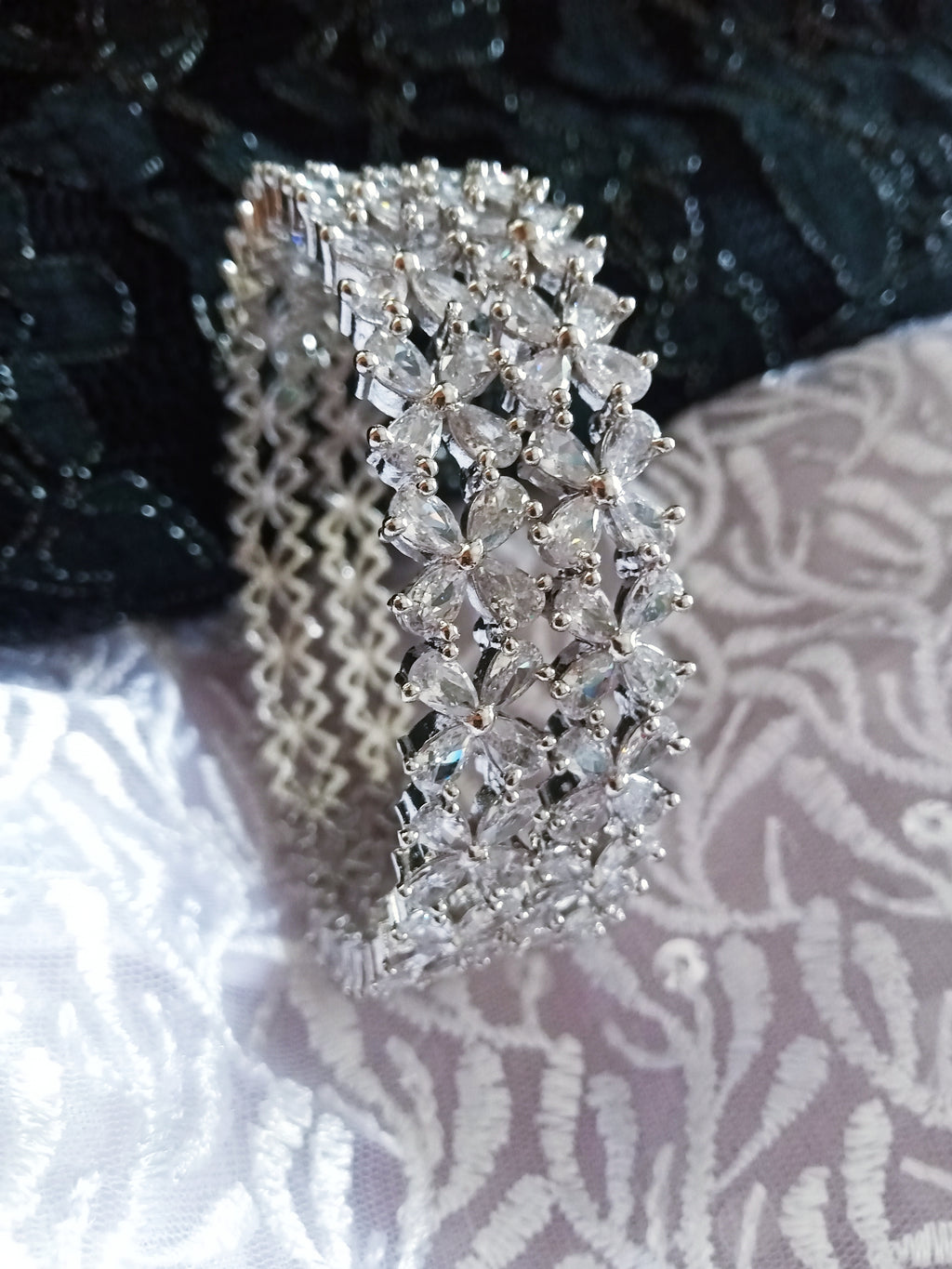 B054_S_ Classy Silver plated bangles studded with  American Diamond stones.