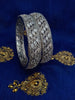 B0158_Elegant design silver crafted bangle studded with American Diamond stones.