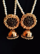 E0113_Classy golden colored earring with delicate work of pearl & Black colored semi precious stones with  Meenakari work.