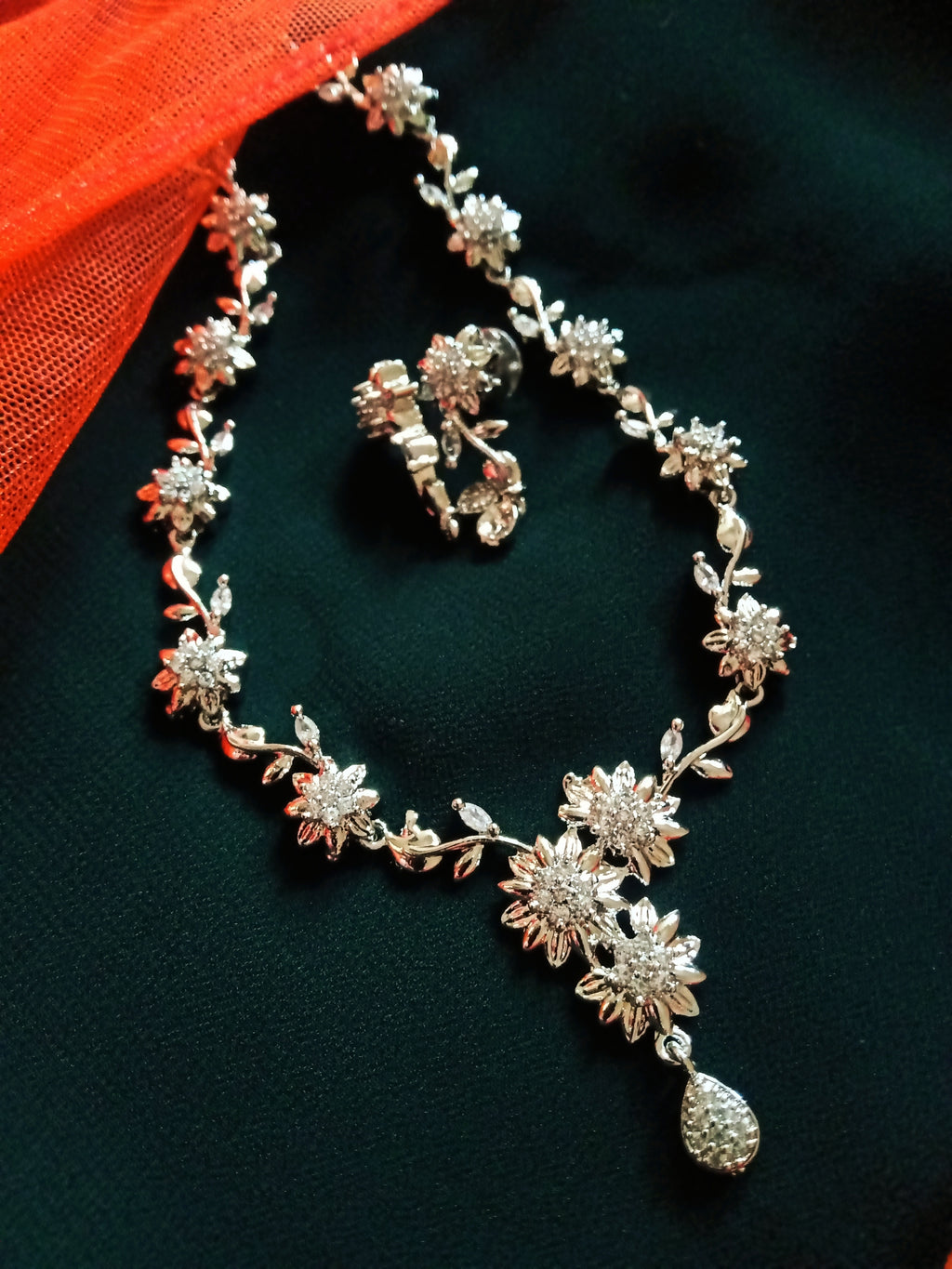 N0351_Lovely flower design  American diamond necklace with delicate stone work.