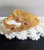 B0230_Lovely traditional Vintage Style Gold Plated studded with american diamond stones with a touch of pink rubies.