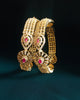 B0230_Lovely traditional Vintage Style Gold Plated studded with american diamond stones with a touch of pink rubies.