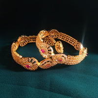 B0230_Lovely traditional Vintage Style Gold Plated studded with american diamond stones with a touch of pink rubies.