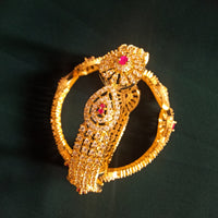 B0230_Lovely traditional Vintage Style Gold Plated studded with american diamond stones with a touch of pink rubies.