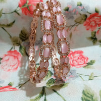 B0231_Elegant Rose Gold bangles embellished with American Diamond stones with a touch of dazzling pink stones.