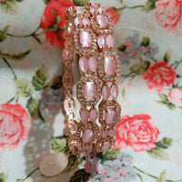 B0231_Elegant Rose Gold bangles embellished with American Diamond stones with a touch of dazzling pink stones.