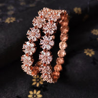 B0155_S_Elegant Rose gold bangle with flower design studded with American Diamond stones.