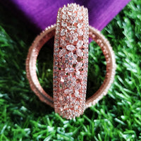 B0239_S_Ravishing Broad Rose gold bangle with delicate flower design embellished with American Diamond stones.