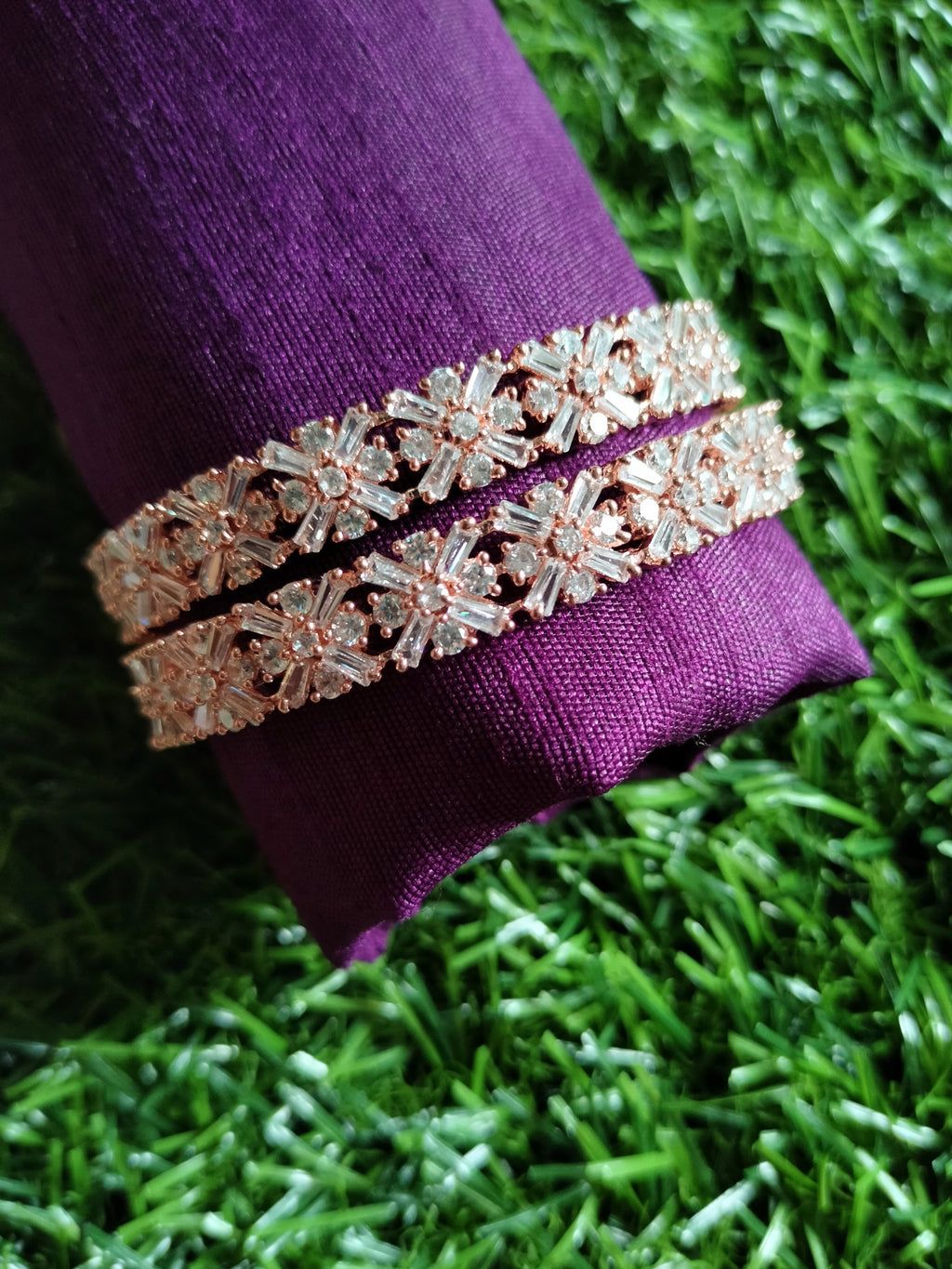 B0240_Lovely Rose gold bangle with delicate design embellished with American Diamond stones.