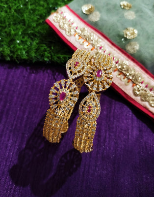 B0230_Lovely traditional Vintage Style Gold Plated studded with american diamond stones with a touch of pink rubies.